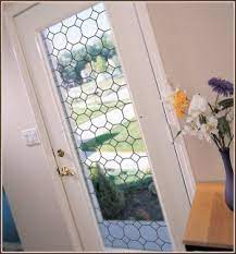 The glass doors allow people to see and anticipate each other while walking through. Tudor Leaded Glass See Through Film Wallpaper For Windows Leaded Glass Decorative Window Film Timeless Decor
