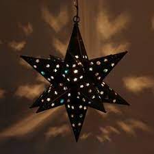Light fixtures should be attached to electrical boxes nailed to a stud or rafter, but if your fixture doesn't weigh much, you can use a remodeling box that anchors to the drywall. 22 Best Mexican Tin Star Lights Ideas Tin Star Lights Tin Star Lights