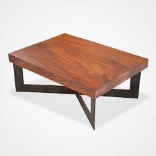 It has the size of 40 w x 20 h inches. Solid Wood Tamburil Slab Coffee Table Metal Base Rotsen Furniture