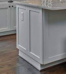 Matching base cabinet end panel in satin white. How To Place Island End Panels