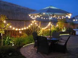I Love How The Boring Fence Is Dresses Up With Lights Backyard Lighting Outdoor Christmas Lights Backyard Makeover