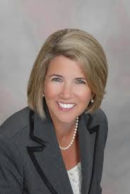 Please change the background and fix her stray hairs. Thank you!