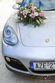 Porsche For Wedding Car With A Simple Flower Arrangement In 2020 Wedding Car Wedding Car Decorations Wedding Flower Arrangements