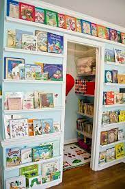 Manage toys without a playroom makinghomebase 2. Book Storage Wall By Project Nursery Kids Playroom Toy Rooms Travel Nursery