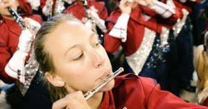 Dress those lines, hit those notes: It's Band Day at UA