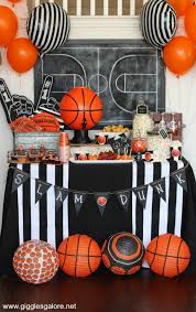 We love this creative baseball party table centerpiece filled with peanuts and popcorn!. Let The Madness Begin Plan A March Madness Basketball Party And Invite Friend Basketball Theme Party March Madness Party Decorations Basketball Theme Birthday