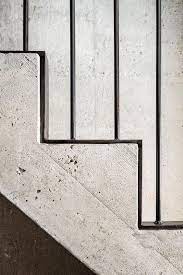 Handrails are wrought iron and painted black. Stairs Details Concrete Concrete Staircase Staircase Handrail Interior Staircase