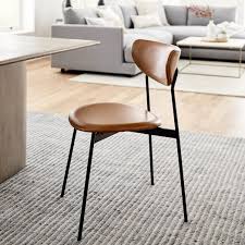They are sleek and come in classic colors like black, tan, brown, or one can use synthetic leather or a leather blend to upholster the modern dining room chairs. Mid Century Modern Petal Upholstered Dining Chair Leather