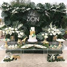 For a perfect jungle theme, turn the room or backyard into a wild jungle with green, yellow, brown balloons, streamers, real or craft plants and hanging ropes here and there to mimic the vines of the jungle and hang some stuffed monkeys or green paper cut leaves. 900 Jungle Theme Baby Shower Ideas In 2021 Baby Shower Jungle Baby Shower Theme Baby Shower Themes