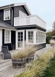 Black And Grey Houses Going Grey Dark Grey House Exterior Black House Exterior Beach Cottage Style