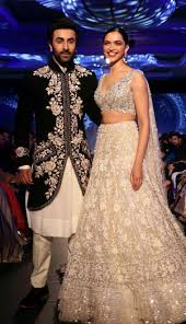 Deepika Padukone And Ranbir Kapoor Unite Together For Ramp Walk Of The Mijwan Fashion Sho Indian Wedding Outfits Indian Reception Outfit Manish Malhotra Bridal