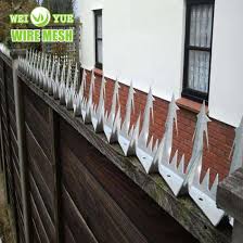 Fence on top of a wall. China Anti Climb Security Razor Spikes Used On The Wall Fencing Top China Wall Spikes Barbed Wire