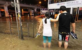 Storm level downgraded twice before amber warning cancelled at 12.30pm, though some areas a woman walks through central after hong kong's first black rainstorm warning of the year was issued. Hong Kong Sees More Flooding As Second Black Rainstorm Hits City In Months Thatsmags Com