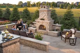 Some people incorporate materials used to construct their fireplace into other outdoor constructions. Outdoor Fireplace Design Ideas Getting Cozy With 10 Designs Unilock