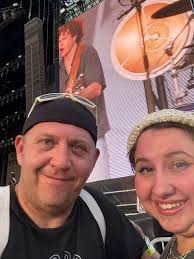 Attending rock concert with friends and son