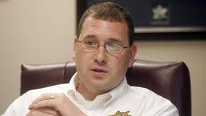 Sheriff Robert Arnold must stay in U.S. for JailCigs case