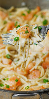 Garlic Shrimp Alfredo Pasta A Simple 35 Minute Dinner Shrimp Is Cooked In Butter And Lots Of Garlic Then Tossed In Recipes Lobster Recipes Entree Recipes