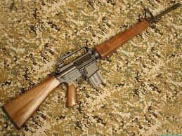 Photos 5 Tactical Guns Made Classy With Wood Furniture Guns Guns Tactical Firearms