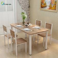 You should have 36 to 48 inches of. Multifunctional Small Apartment Steel Wood Dining Table And Chair Buy Small Extendable Dining Table Restaurant Dining Tables And Chairs Wooden Dining Table And Chairs Product On Alibaba Com