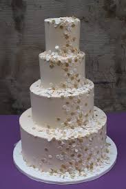 White and gold wedding cake. Wedding Cakes Alliance Bakery