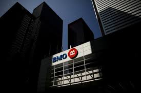 bank of montreal takes job cuts charge in drive for lower