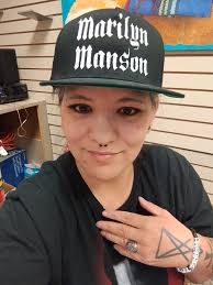 At work, sporting Manson