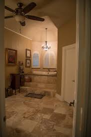 Master bath remodel traditional bathroom, austin this complete master bath remodel includes a frameless shower, travertine surround, soaker tub, marble countertop, and dark custom cabinets. Travertine Bathroom Remodeling Project In Austin Tx West Lake Hills Vintage Modern Design Build In Austin Texas