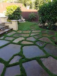 Flagstone Pavers Inset In Smartgrass Synthetic Turf Artificial Grass Backyard Artificial Grass Installation Artificial Grass Patio