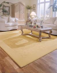 Yellow Area Rug With Light Wood Floor Light Wood Floors Flooring Carpet Flooring