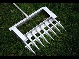 So an idea came up to build an improvised manual aerator using an old garden rake and some. Diy How To Make A Lawn Aerator Youtube