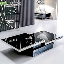 You can find a wide variety of coffee tables on various online sites that come in different shapes such as abstract, oval, rectangle, round, and square. China Luxury Rotatable Square Glass Top Center Table With Two Drawer China Coffee Tables Two Drawer Tables