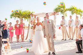 Mint, coral and taupe wedding. A Coral Beach Wedding At Grand Plaza Hotel In St Pete Beach Florida The Celebration Society