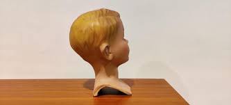 Each mannequin head for sale was constructed with extraordinary care, often using plaster, wood and glass. Vintage French Plaster Child Mannequin Head For Sale At Pamono