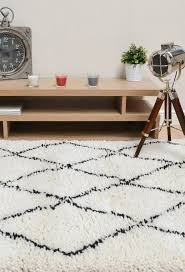 Black And White Wool Rug Uk Benni Ben01 Wool Shaggy Rugs In Ivory Black Free Uk Delivery Shaggy Rug Rugs Uk Wool Rug