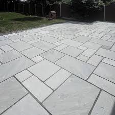 Find the perfect stone paving stock photo. Kandla Grey Indian Sandstone Paving Slabs Patio Packs 22mm Cal 26 42 Stone Paving Direct