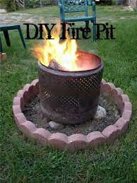 Fire Pit From Washing Machine Drum Use Rocks For Base Diy Fire Pit Fire Pit Old Washing Machine