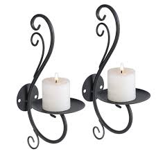 These beautifully decorated hanging tealight candle holders are elegantly designed to fit into all types of interior decor and are true statements of outstanding craftsmanship. Iron Candle Holder Wall Art Candle Hanging Candlestick Holder Home Decoration Tealight Candle Stand Buy Online In Antigua And Barbuda At Antigua Desertcart Com Productid 195561715