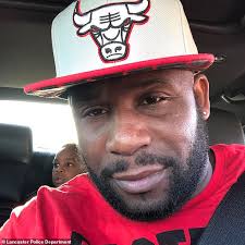 Brother of ex-NFL star Aqib Talib has handed himself in to cops after  'killing youth football coach'
