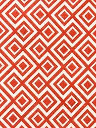 This cushion cover is made from a decor weight fabric featuring a modern chinoiserie trellis pattern in a very livable orange and white. Orange Upholstery Fabric Orange White Fabric By The Yard Geometric Fabric Orange Geometric Upholstery Fabric Decor Coral Fabric