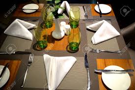 To begin, formal table settings typically include a tablecloth and centerpieces. Table Setting In Fine Dining High Class Restaurant Stock Photo Picture And Royalty Free Image Image 24666189