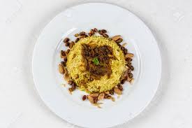 · sauté the onion in olive oil until just golden to develop the sweet flavor. Traditional Middle Eastern Fish And Fried Rice Dish With Fried Pine Nuts Chips And Lemon Stock Photo Picture And Royalty Free Image Image 81696139