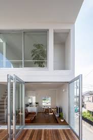 Create a custom design or check out this inspiration for stylish balconies. Two Patios Cut Through Little House Big Terrace
