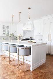 Gold + white mid mod style. White And Gold Kitchen With Gold And Gray Island Stools Transitional Kitchen