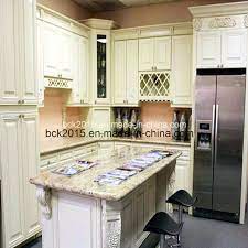 When you contrast the minimal cost of paint and materials to the incredibly high cost of new kitchen cabinets, painting your cabinets is a clear winner. China Bck European Style Wood Kitchen Cabinet White Paint Us Red Oak China Kitchen Cabinet Wood Kitchen Cabinet