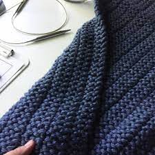 This knit mermaid tail blanket is a snuggle sack with area made for the feet. Free Blanket Knitting Pattern For Super Bulky Yarn The Boulevard Blanket Fifty Four Ten Studio