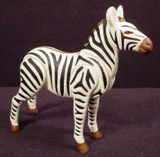 We dig how she fills up a sofa or accent chair, too. Playmobil Zebra Animal Figure 3255 5759 4064 4081 3240 4828 Zebras Animal Animal Figures Zebra