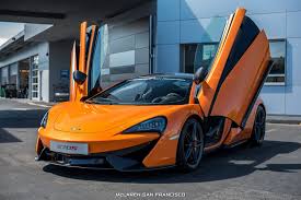 Ventura Orange Mclaren 570s Coupe By Mso Front Side View Doors Up Gallery Maclaren Cars Mclaren Mclaren 570s