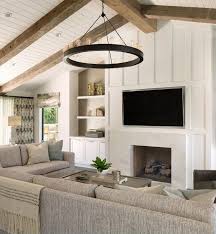 Living Room Paneling Thick Board And Batten On Fireplace With Vaulted Ceiling Featuring Re Vaulted Ceiling Living Room Vaulted Living Rooms Living Room Ceiling