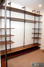 Using your 1 1/2″ spade bit, you're going to drill three holes through each 70″ board and two holes through each 36″ board. How To Build A Diy Industrial Pipe Walk In Closet
