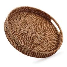This element is a round wicker table that looks like an ottoman. Round Rattan Woven Serving Tray With Handles Ottoman Tray For Breakfast Drinks Snacks For Coffee Table Home Decorative Honey Brown 13 8 X2 Buy Online In Cambodia At Cambodia Desertcart Com Productid 127355487